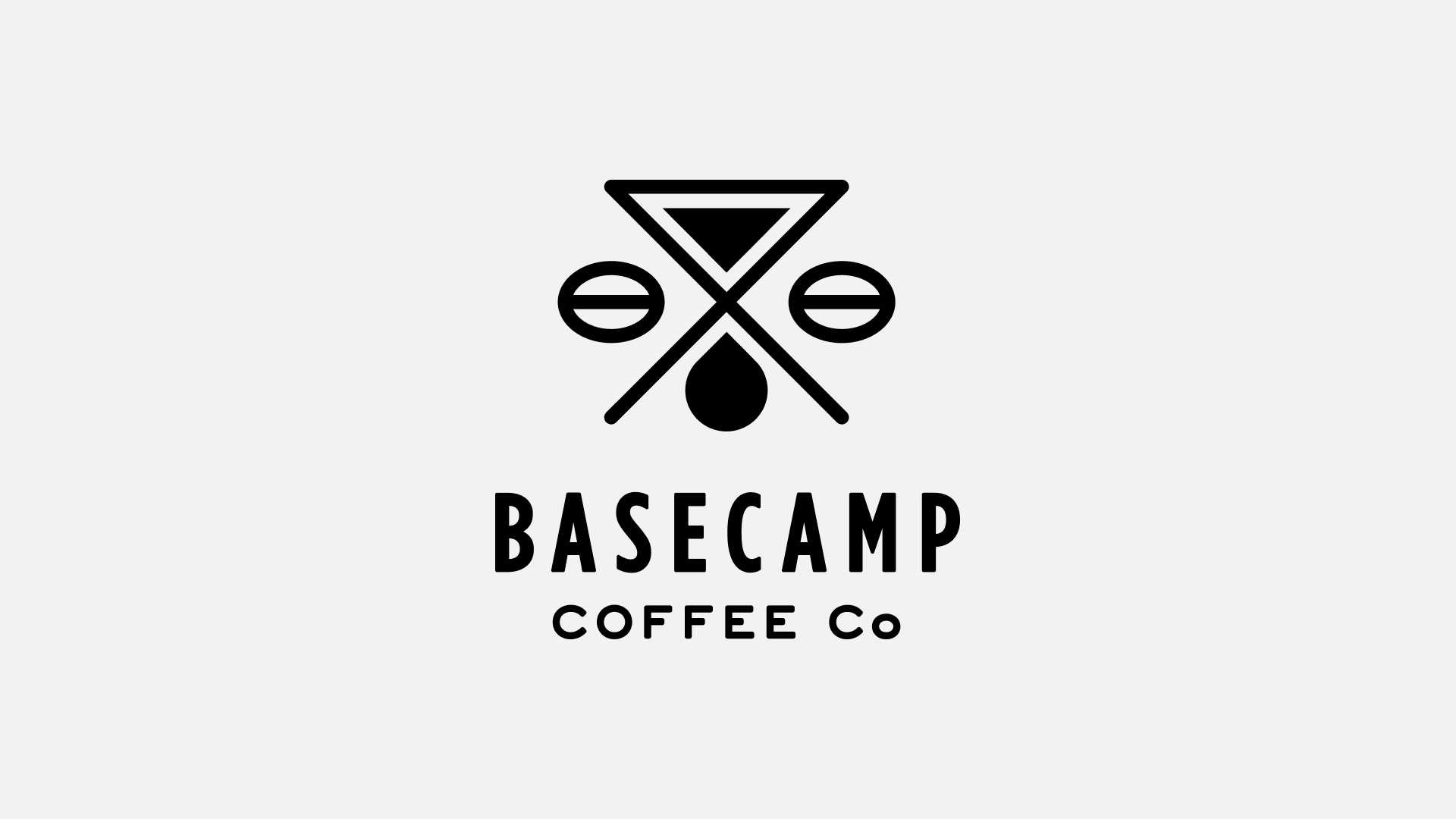 Logo with an x and two beans, based on the hobo symbol for safe camp with words Basecamp Coffee Co.